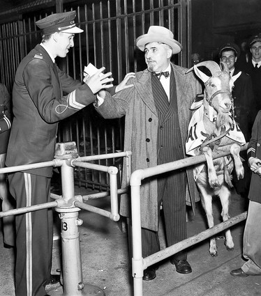 Olaf Logan, Frain usher, stops William Sianis, owner of the Billy Goat Tavern at 1855 W. Madison Street from entering the ball park October 12, 1945. Sianis crashed the gate but could not seat the goat in the box. Sianis is going to sue. Tribune file photo. (baseball World Series, Chicago Cubs, Detroit Tigers)